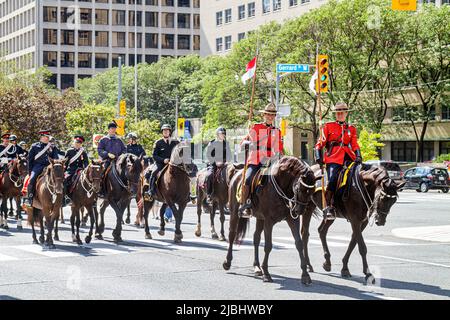 Toronto Canada,University Avenue,Police Equestrian Day,Royal Canadian Mounted Police,Mounties,horses parade drill team officers men male uniforms Stock Photo