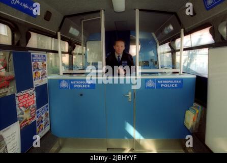 Mobile London Met Police bus reception desk Stock Photo