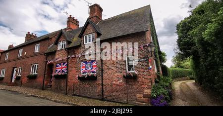 Decorations in the village of Great Budworth, Chershire during the platinum jubilee. Stock Photo