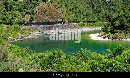 Hawks Crag road cutting for State Highway 6 above the Buller river flowing westward towards Westport, in the Buller gorge, Aotearoa / New Zealand Stock Photo