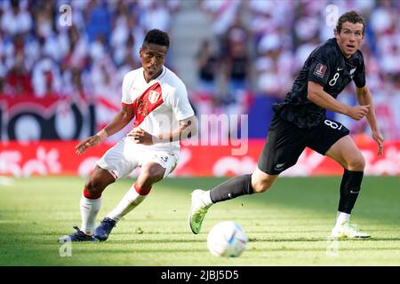 Santiago Ormeno of Peru and Joe Bell of New Zealand during the friendly match between Peru and New Zealand played at RCDE Stadium on June 5, 2022 in Barcelona, Spain. (Photo by Bagu Blanco / PRESSINPHOTO) Stock Photo