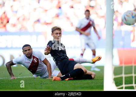 Niko Kirwan of New Zealand and Alexander Callens of Peru during the friendly match between Peru and New Zealand played at RCDE Stadium on June 5, 2022 in Barcelona, Spain. (Photo by Bagu Blanco / PRESSINPHOTO) Stock Photo