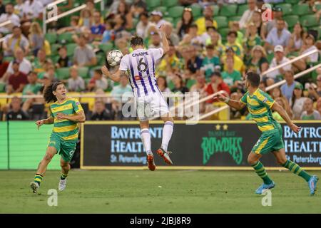 St. Petersburg, FL: Louisville City FC defender Wes Charpie (6) heads the ball during a USL soccer game against the Tampa Bay Rowdies, Sunday, June 5, Stock Photo