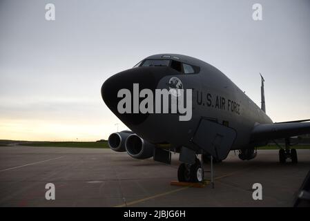 A KC-135 aircraft assigned to the Iowa Air National Guard’s 185th Air Refueling Wing sits on the ramp at the 132nd Wing in Des Moines, Iowa, May 17, 2022. The Aircraft diverted from Topeka Kansas to Des Moines to avoid sever weather. (U.S. Air National Guard photo by Master Sgt. Daniel Ter Haar) Stock Photo