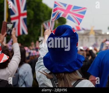 London, Greater London, England, June 04 2022: Jubilee Concert at The Mall. People wave Union Jacks flags and take photos. Stock Photo