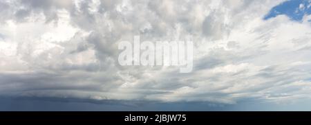 thick clouds in blue sky with white clouds in clear weather Stock Photo