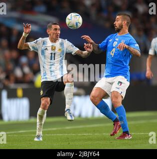 01 Jun 2022 - Italy v Argentina - Finalissima 2022 - Wembley Stadium Argentina's Angel Di Maria and Leonardo Spinazzola. Pic : Mark Pain / Alamy Stock Photo