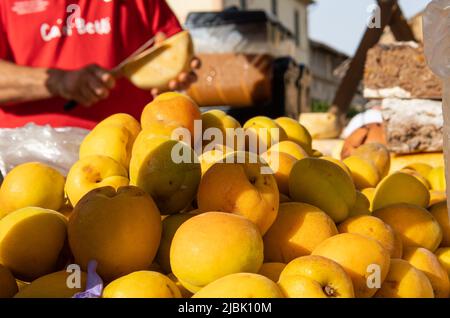 Annual apricot fair held in the Majorcan town of Porreres, Spain. Street stalls selling apricots and deserts Stock Photo