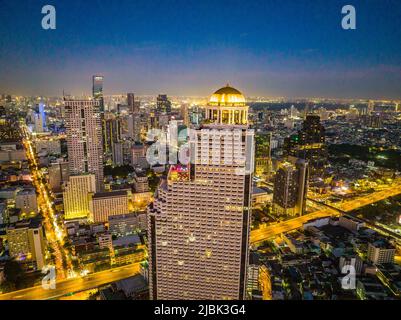 Aerial view of Saphan Taksin district near the Taksin bridge and Chao Phraya river, Bangkok, Thailand Stock Photo