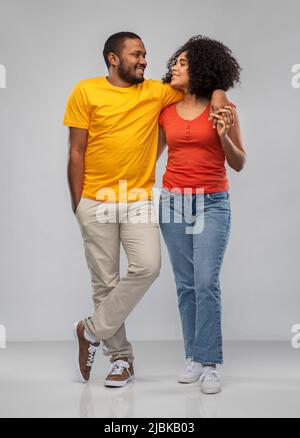 happy african american couple hugging Stock Photo