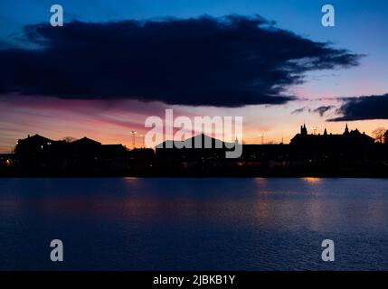 Evening photo of Akershus festning in Oslo, the main capital of Norway. Sunset, with nice clouds and colors in the sky. Stock Photo