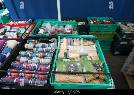 File photo dated 03/03/21 of food laid out in crates at a food bank in north London. The cost of food is a 'major future concern' for three quarters of UK consumers and the number using a food bank has jumped from one in 10 to nearly one in six since last year, figures suggest. Issue date: Tuesday June 7, 2022. Stock Photo