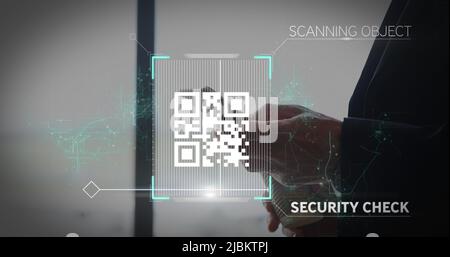 Image of white QR code scanning with blue web of connection over man Stock Photo