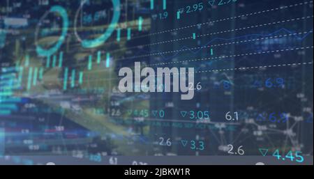 Image of financial data and graphs over cityscape Stock Photo