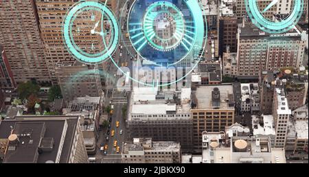 Image of moving clocks and scope scanning over cityscape Stock Photo