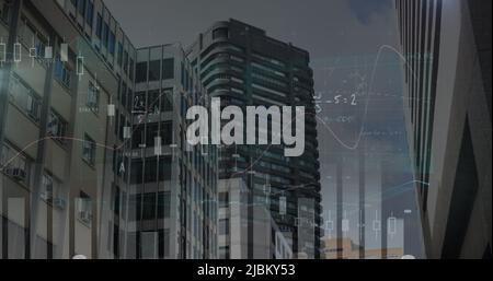 Image of statistics processing and mathematical equations over cityscape Stock Photo