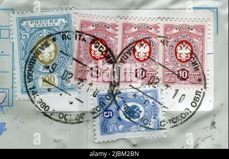 Stamp printed in Russia shows image of the Coat of Arms, circa 2022. Stock Photo