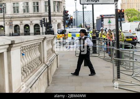 London, UK. 7th June, 2022. A suspect package inside a telephone box caused whitehall to be closed and a robot used to investigate; it is understood a controlled explosion was used. Credit: Ian Davidson/Alamy Live News
