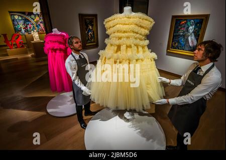 London, UK. 7th June, 2022. Two of Six dresses from British Fashion Designer Molly Goddard with other works - The Art of Literature Exhibition with Fashion by Molly Goddard, part of London Now, at Christie's, London. Credit: Guy Bell/Alamy Live News