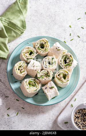 Cream cheese dill cucumber tortilla wrap Stock Photo