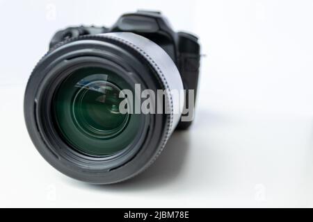 Professional dslr camera equipment with 70-300 mm tele zoom objective with wide camera lens in macro close-up view show details photographic equipment Stock Photo