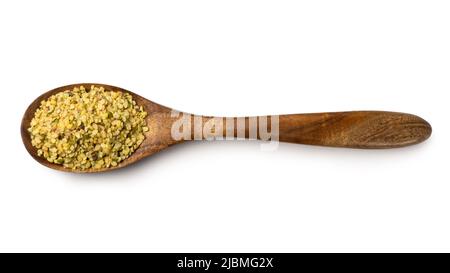 split skin removed mung beans or green grams in a wooden spoon, also known as moong seeds, staple ingredient in southeast asian dishes