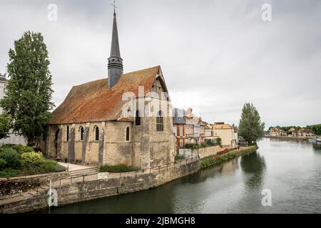 The catholic church of Saint-Maurice located in Sens, Yvonne, France. It was the parish of fishermen and sailors., France. It was the parish of fisher Stock Photo