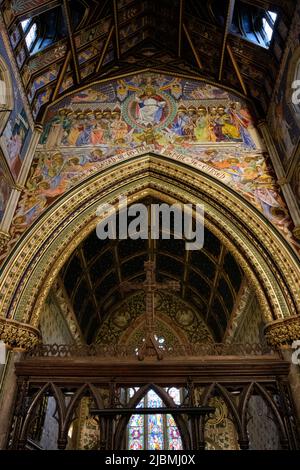 Holy Innocents Church, Highnam, Gloucestershire - interior, frescoes and stained glass Stock Photo