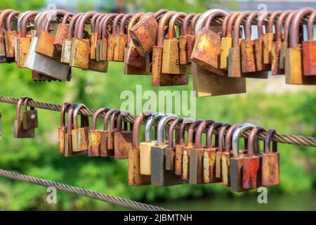 love locks hanging on a bridge Stock Photo