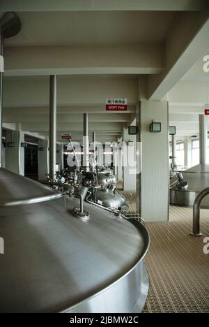 Large fermenting tanks at the Kirin Beer Brewery in Okayama, Honshu, Japan Stock Photo