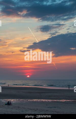 Sunset on a beach Stock Photo