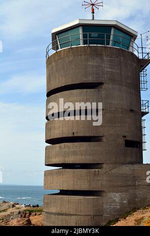 UK, Jersey Island,  German WWII watchtower and bunker at La Corbiere, now a transmitting station Stock Photo