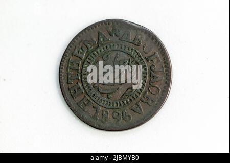 One Paisa vintage antique copper coin of Muhammad Ismail Khan of the Princely state of Jaora in India showing the reverse with a date of 1896, stock p Stock Photo