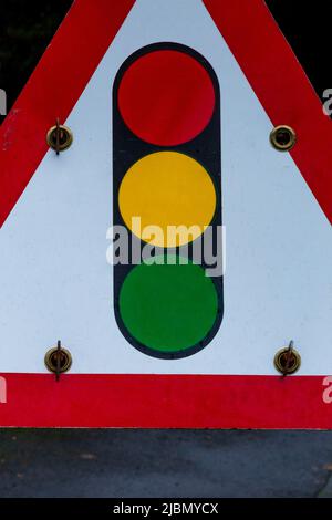 A temporary traffic light sign (UK) close up. Traffic signal ahead. Stock Photo