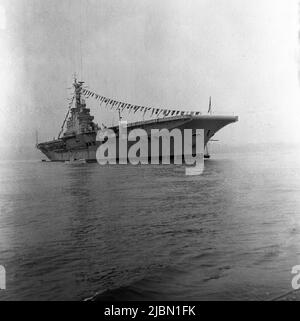 1950s, historical, the Royal Navy light aircraft carrier, HMS Centaur moored in the sea, England, UK. Stock Photo