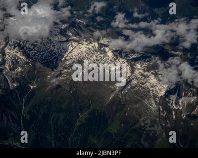 Innsbruck valley aerial panorama from airplane landscape Stock Photo