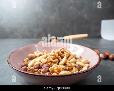 Mix nuts on a wooden background. High quality photo Stock Photo