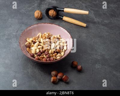 Mix nuts on a wooden background. High quality photo Stock Photo