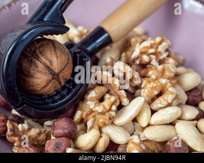 Mix nuts on a wooden background. High quality photo Stock Photo