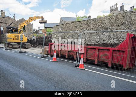 Traffic lights on the A65 at Kayley Hill Long Preston , where one lane is closed for up to 6 weeks whilst a wall is taken down and rebuilt Stock Photo