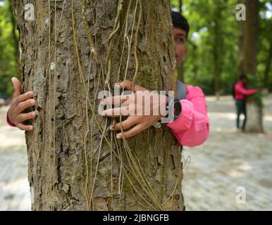 Child Subhas School children of Netaji Subhas Vidyaniketan pose and hug trees for ...