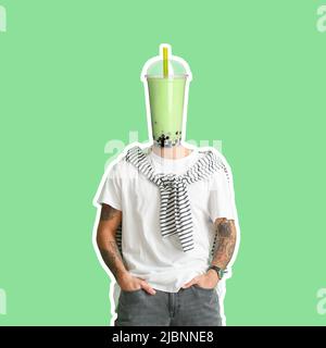 Tattooed man with cup of tasty bubble tea instead of his head on green background Stock Photo