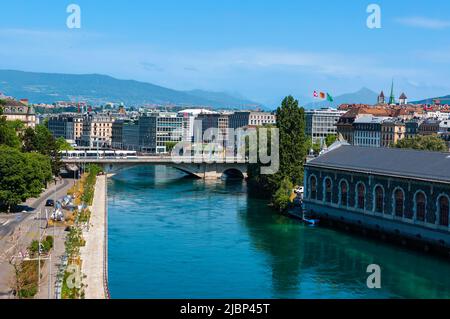 Geneva, Switzerland - June 3, 2022: Cityscape of Geneva with a river Rhone and a bridge Stock Photo