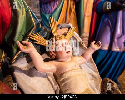 Feldkirch, Austria - January 21, 2022: The Christmas figure of the newborn Jesus in the manger Stock Photo