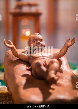 Solothurn, Switzerland - December 25, 2021: The Christmas figure of the newborn Jesus in the manger Stock Photo