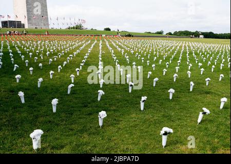 Washington, United States. 07th June, 2022. Flowers representing victims at the opening of the National Gun Violence Memorial. Credit: SOPA Images Limited/Alamy Live News