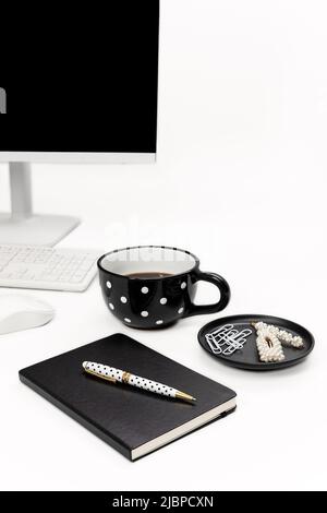 Black and White Styled Desk Workspace Stock Photo