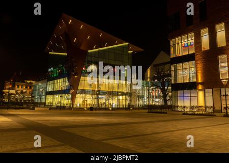 Gdansk Poland - April 2022. Forum gallery shopping mall at night. Modern shopping and entertainment centre. Architecture in the city center of Gdansk is the historical capital of Polish Pomerania with medieval old town architecture Stock Photo