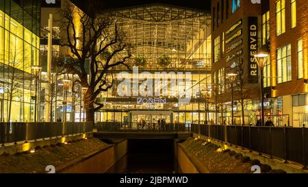 Gdansk Poland - April 2022. Forum gallery shopping mall at night. Modern shopping and entertainment centre. Architecture in the city center of Gdansk is the historical capital of Polish Pomerania with medieval old town architecture Stock Photo