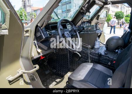 Urban war scenario, military equipment inside a combat vehicle. NATO military forces. Panhard M11D 4x4 M/89-91. Light armored vehicles. Stock Photo